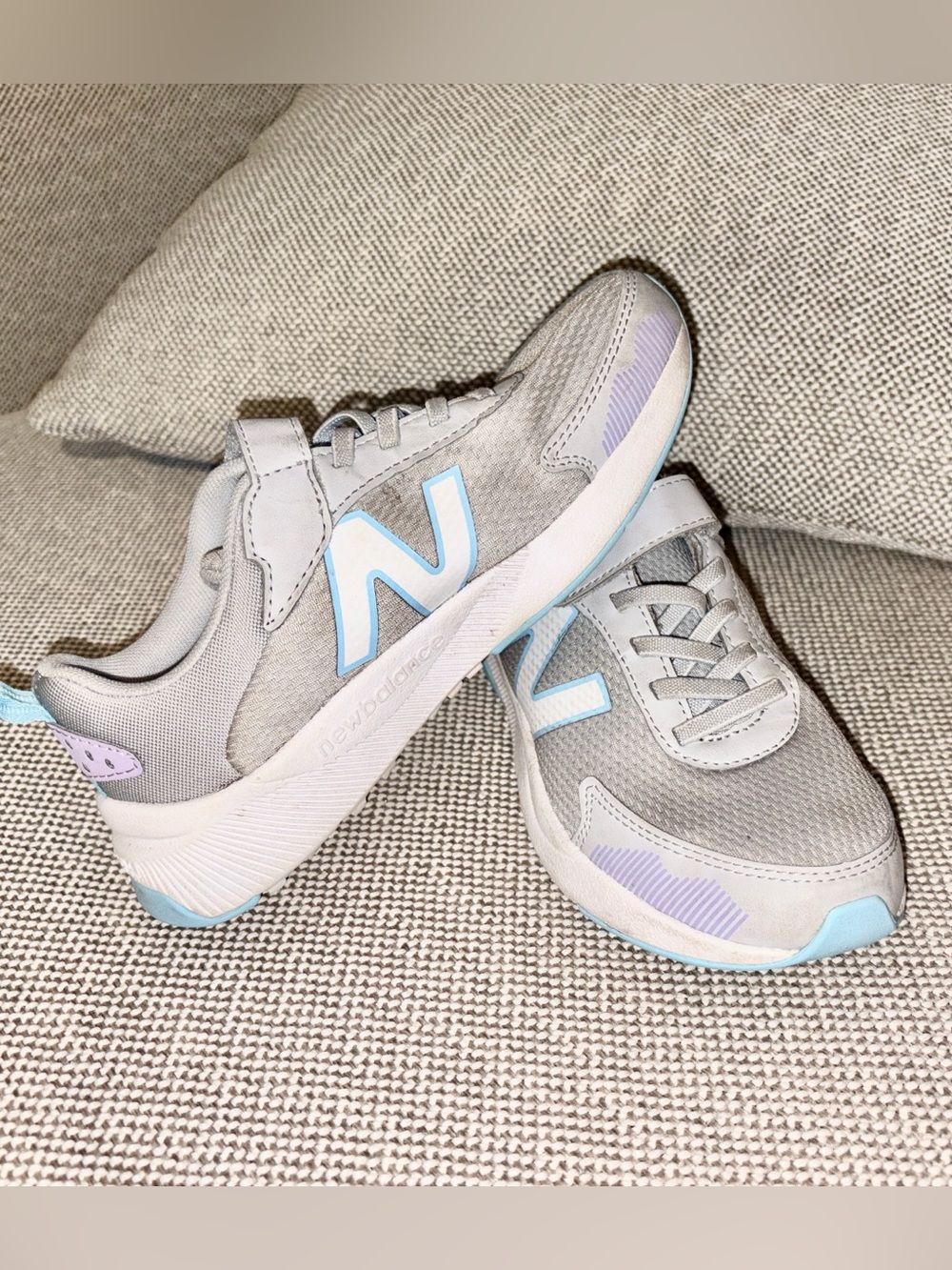 New Balance Kids Gray Sneakers with Purple and Blue Accents